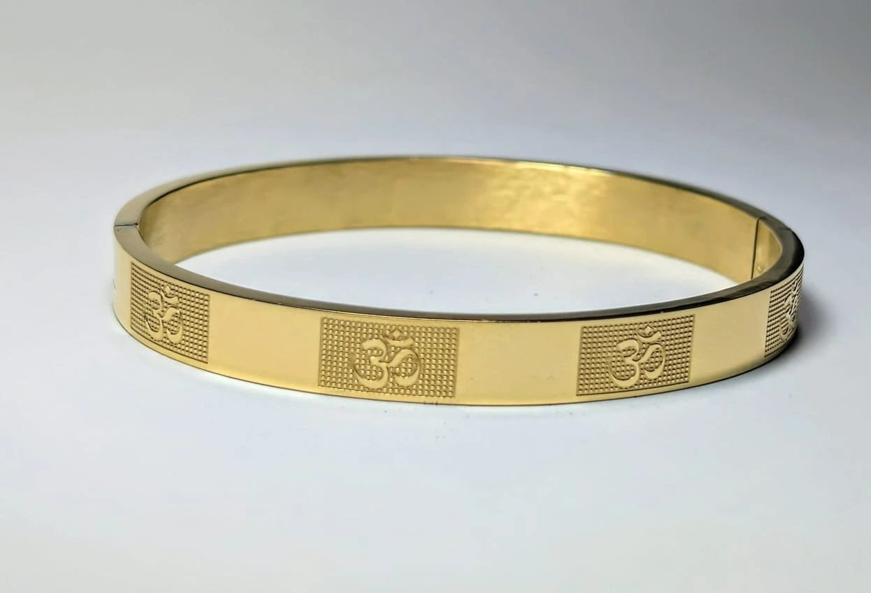 Om Pattern Gold Toned Kada (bracelet)